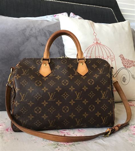 louis vuitton purse lock|second hand Louis Vuitton purses.